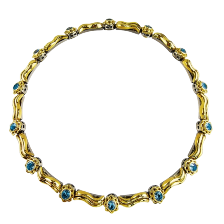 24208 Flowing Lines Wave Necklace Designed & Handmade by Kaufmann de Suisse 18kt White & Yellow Gold featuring 2 Bezel Set Cushion Cut Blue Topaz weighing a total of 30.10cts mounted with 56 Round